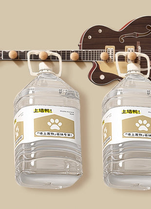 Creative guitar-shaped coat rack decorative painting behind the front key hanger