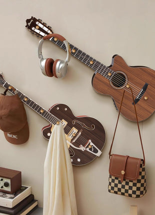 Creative guitar-shaped coat rack decorative painting behind the front key hanger